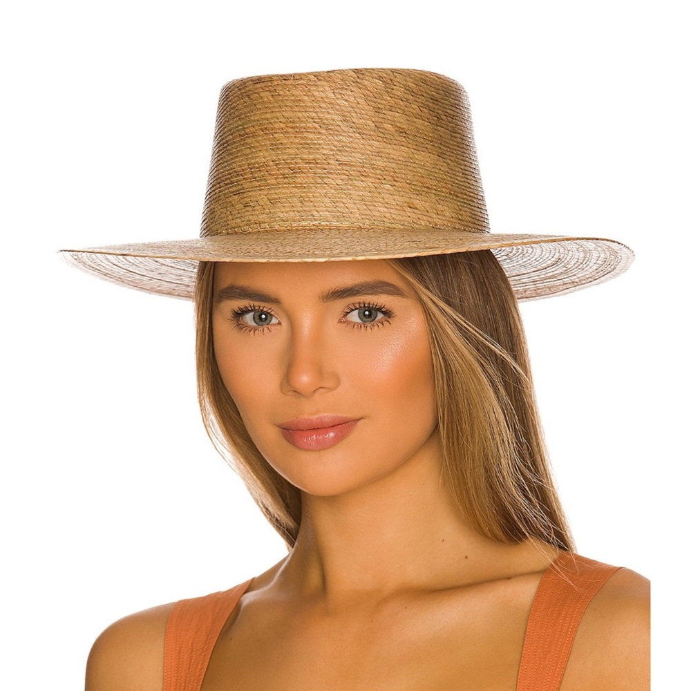 Lack of color hat. Never worn.